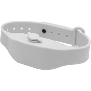 A white wristband hand sanitiser dispenser with an adjustable strap and a small button for dispensing.