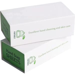 A package of travel soap sheets in white and green, featuring a logo. Suitable for hand cleaning and skin care.