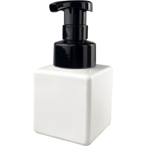A square white foaming soap dispenser with a black pump top. Features a logo on the front.