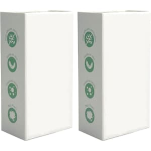 A white box set featuring green designs, containing paper soap and a bottle, ideal for hampers.