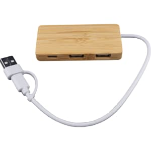 A bamboo USB hub featuring three ports and a white connecting cable.