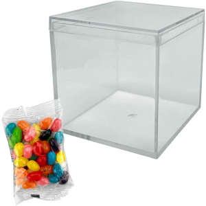 A clear cube container beside a pack of colourful jelly beans, featuring various bright hues and shapes.