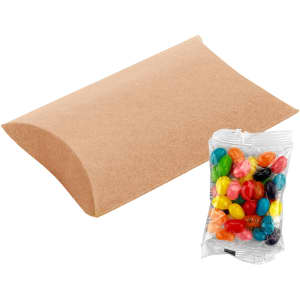 A pillow-shaped box beside a bag of colourful jelly beans in various shades, including pink, green, yellow, and blue.