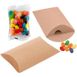 A pillow-shaped package containing colourful jelly beans in various shades, alongside an empty pouch.
