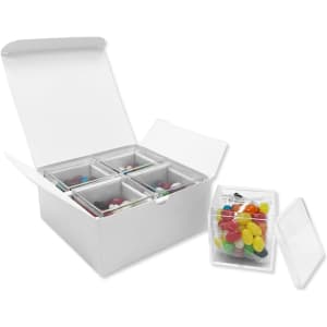 A white gift pack containing four clear compartments filled with colourful jelly beans.