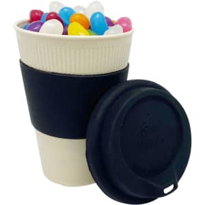 A reusable 12oz bamboo cup with a black lid and sleeve, filled with colourful jelly beans.