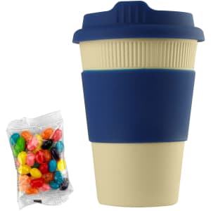 A reusable coffee cup in cream with a navy silicone sleeve, accompanied by a pack of colourful jelly beans.