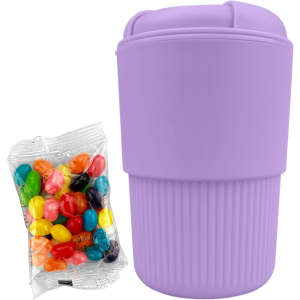 A reusable coffee cup in lavender with a ribbed design, accompanied by a packet of colourful jelly beans.
