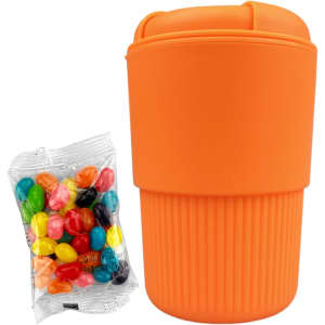An orange reusable coffee cup with a ribbed design, accompanied by a bag of colourful jelly beans.