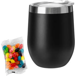 A black coffee cup with a stainless steel lid next to a bag of colourful jelly beans.