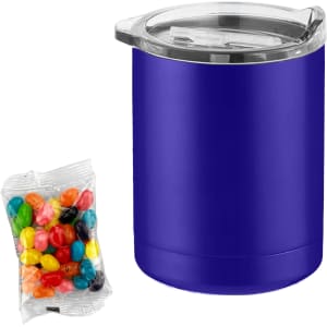 A purple coffee mug with a transparent lid accompanied by a packet of colourful jelly beans.