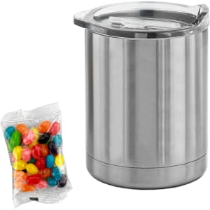A silver coffee mug with a clear lid beside a packet of colourful jelly beans. The mug has a branding logo.