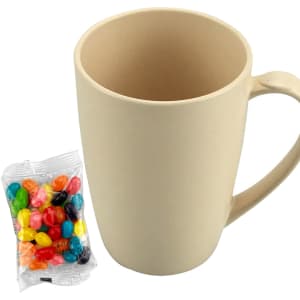 A bamboo mug in light beige next to a bag of colourful jelly beans, featuring a simple design and a handle.