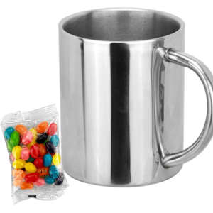 A silver stainless-steel mug alongside a packet of colourful jelly beans. The mug features a handle and has a logo.