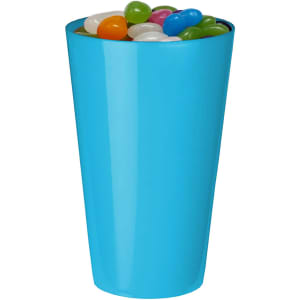 A bright blue cup filled with multicoloured jelly beans, including green, white, orange, and pink.