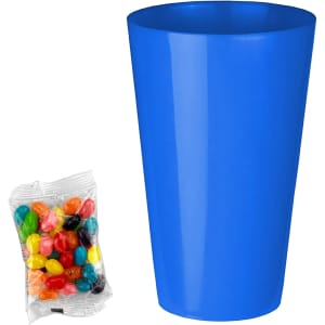 A bright blue party cup alongside a pack of colourful jelly beans in various shades.