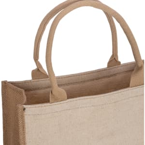 A tan reusable grocery bag with two sturdy handles and a simple, unlined design. It has a logo on one side.