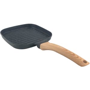 A square grill pan featuring a black non-stick surface and a wooden handle. It has a textured grill base.