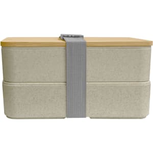 A wheat straw lunch box pack in light grey, featuring a bamboo lid and secured with a grey strap.