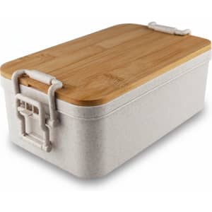 A bamboo lunch box with a light grey base and a wooden lid, featuring clips on the sides.