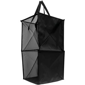 A black Nora Laundry Basket with a foldable design and mesh panels, featuring two compartments and carrying handles.