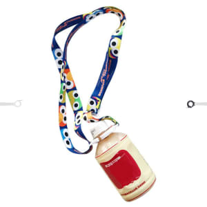 A drink bottle with a multicoloured lanyard featuring a playful design and a branded logo.