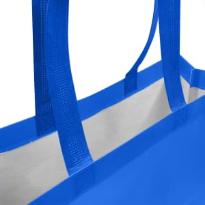 A blue laminated non-woven trade show bag with two handles and a white interior. Features branding.