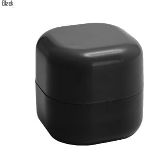 A black cube-shaped lip balm container with a smooth surface and rounded edges. It features a logo on the side.