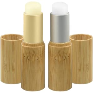 Two bamboo lip balm sticks in natural bamboo holders, one with a creamy yellow balm and the other with a white balm.