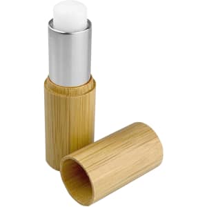 A bamboo lip balm stick featuring a silver top and a natural bamboo casing. The lid is removed, revealing the balm.