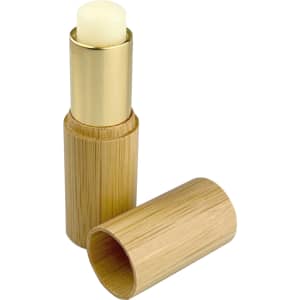 A bamboo lip balm stick with a gold top, featuring a sleek, eco-friendly design.