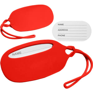 A red silicone luggage tag with a white insert for personal details and a matching strap for attachment.