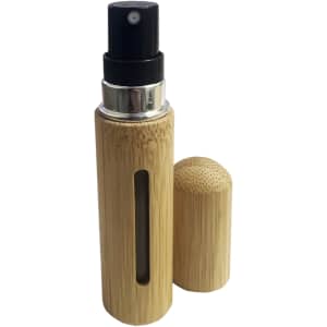 A mini bamboo atomiser in natural bamboo colour with a black spray nozzle and a removable cap.