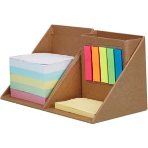A brown memo holder with compartments for sticky notes, featuring pastel-coloured notes and bright sticky flags.