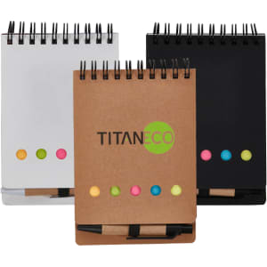 A set of three notepads in white, black, and brown, featuring colourful sticky notes and a pen. Each pad has a logo.