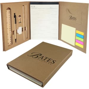 A brown stationery set with a notebook, sticky notes, a ruler, a pen, and a pocket for small items, featuring a logo.