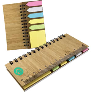 A bamboo sticky note holder with multiple sticky flags in pink, green, and yellow, featuring a ruler on the front.