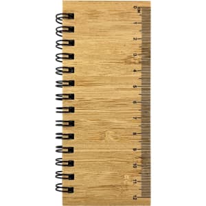 A bamboo sticky note pad with a spiral binding and a ruler printed on the side, featuring a natural wood finish.