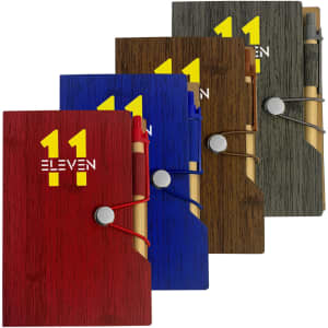 A set of four sticky note pads in red, blue, green, and brown, each with a pen and a logo.