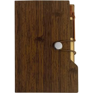 A brown sticky note pad with a wood grain design, secured with an elastic band and featuring a pen holder.