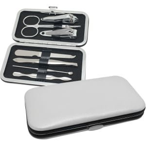 A silver and black manicure set with various tools, including nail clippers, scissors, and tweezers, in a sleek case.