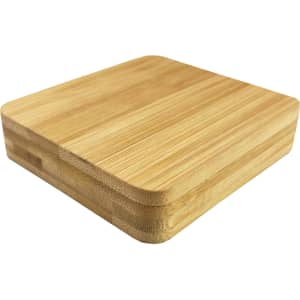 A bamboo manicure set featuring a smooth, natural wood finish with a square, compact design.