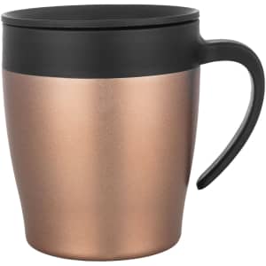 A coffee mug with a metallic rose gold finish and a black lid and handle. It features a sleek, modern design.