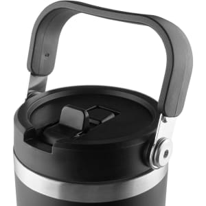 A travel mug with a black body, silver band, and a sturdy handle. It features a secure lid and a branding logo.