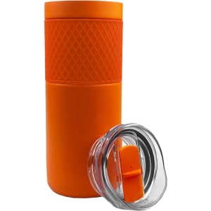 An orange vacuum tumbler with a textured grip and transparent lid featuring a slide opening.