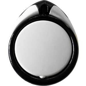 A phone stand in black and white, featuring a smooth, rounded design with a glossy finish and a small logo.