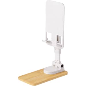 A white mobile stand with a bamboo base, designed to hold smartphones and tablets.