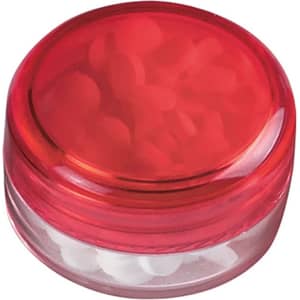 A red screw lid mint jar containing white sugar-free lollies, with a transparent base.