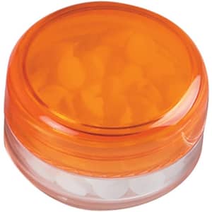 An orange screw lid jar containing white sugar-free lollies, featuring a transparent base.