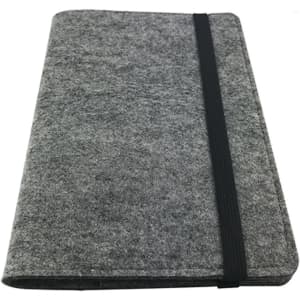 A grey felt notebook with a black elastic band, featuring a minimalistic design and a logo.